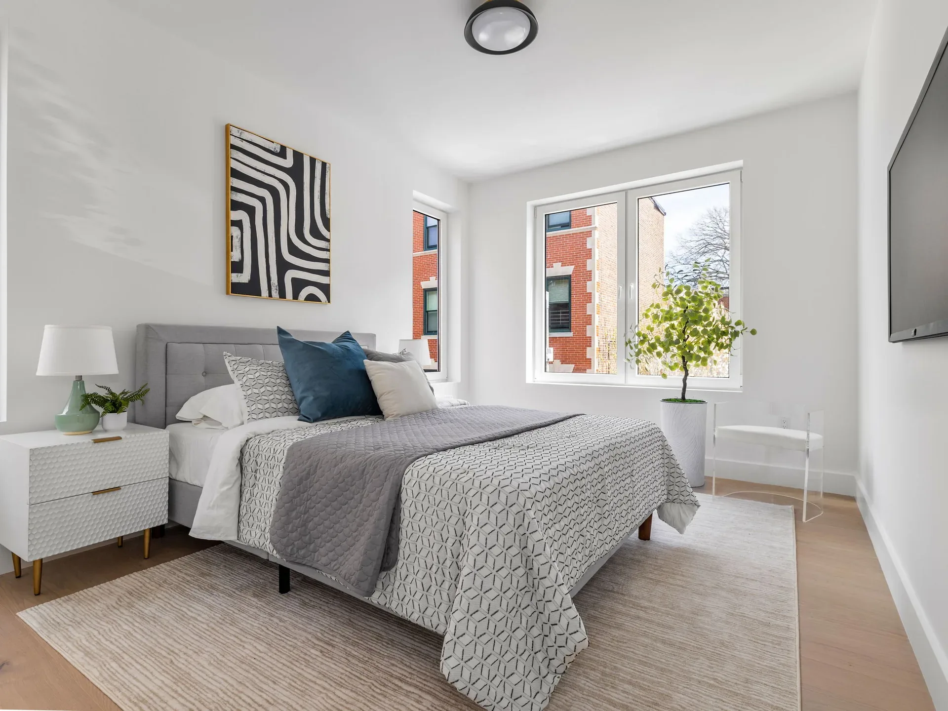 Bright staged primary bedroom